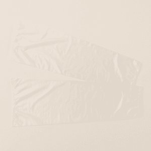 Bolsas de plástico transparentes desechables para tratamientos de parafina en manos y pies.