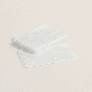 Bolsa blanca desechable para tratamientos de sudoración de manos durante de manicura en centros de estética.
