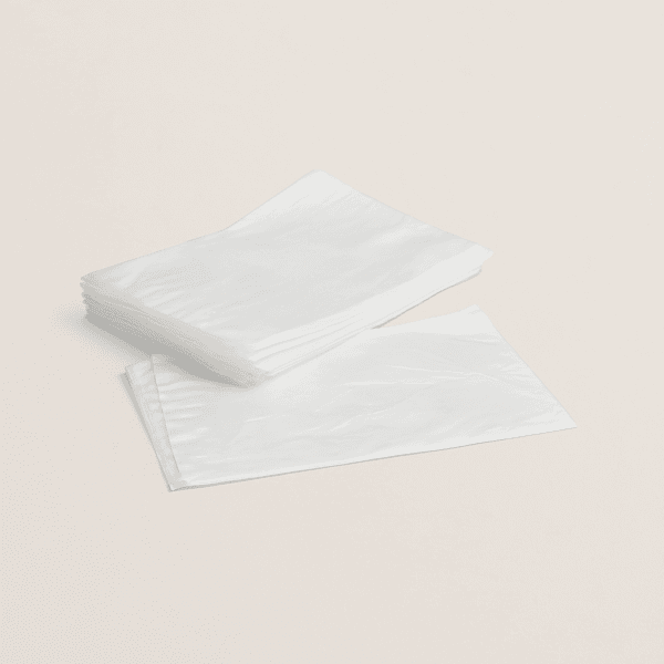 Bolsa blanca desechable para tratamientos de sudoración de manos durante de manicura en centros de estética.