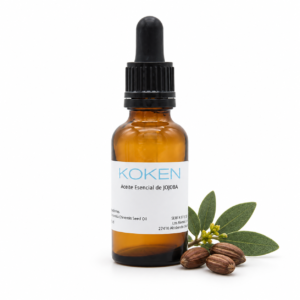 Frasco KOKEN de aceite de jojoba con semillas y hojas sobre fondo blanco