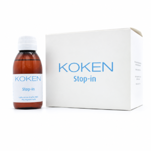 Caja de Stop-in Koken de 6 frascos de 125 ml con un frasco de muestra al lado